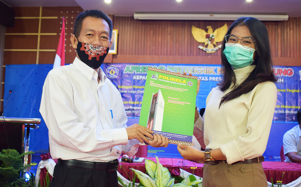 2Juara II Lomba Pekan Seni Mahasiswa Tingkat Nasional