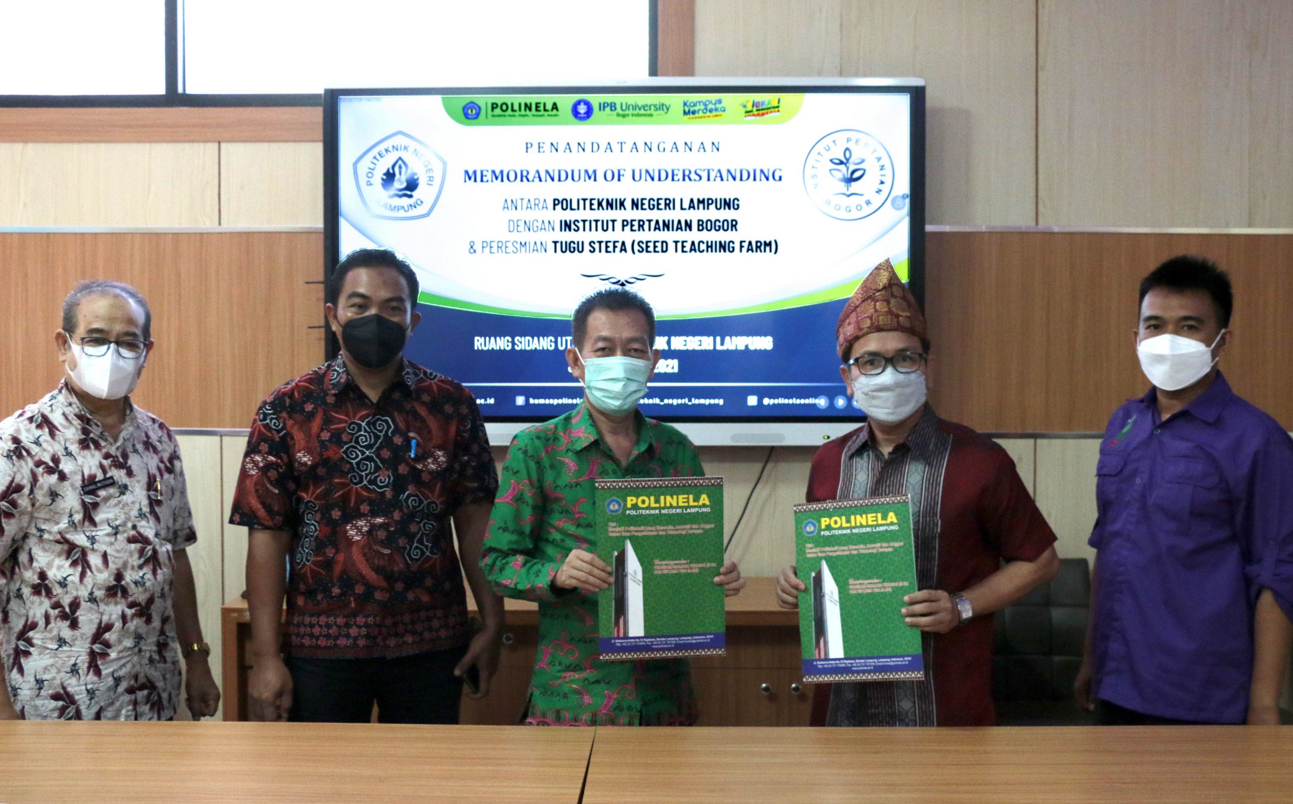 MoU Polinela dan PKHT LPPM OPB University